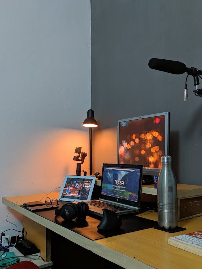 Stylish and modern home office desk with tech gadgets, perfect for remote work and creativity.